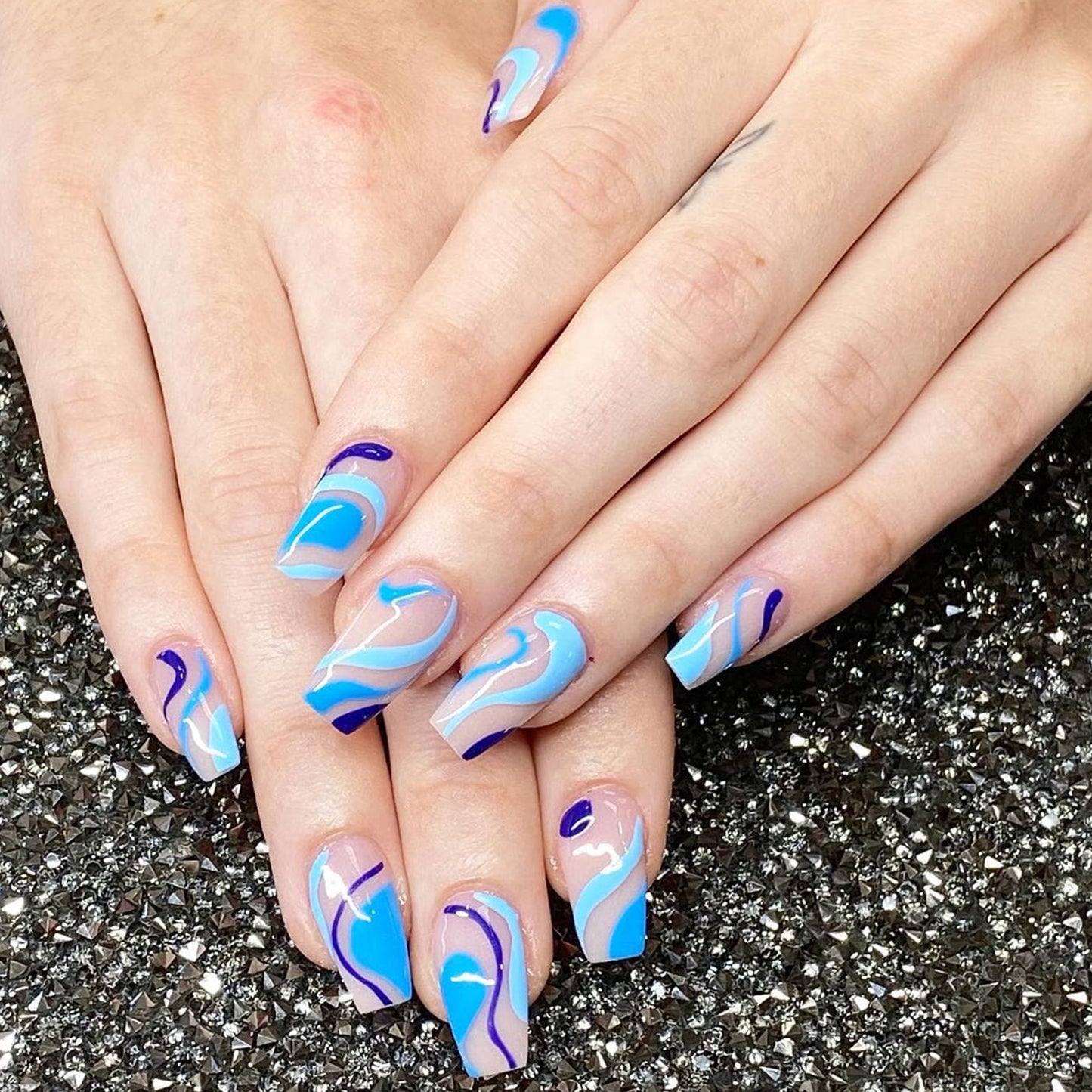 Unique Blue Swirls Medium Almond Press-on Nails