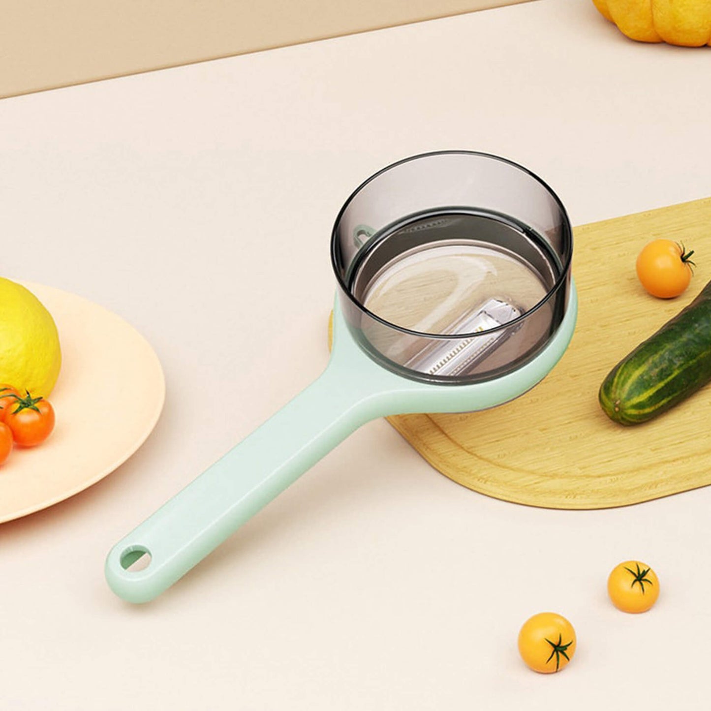 Multi-Functional Peeler With Bucket Container